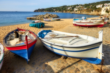 Fototapeta na wymiar Traditional boats in a Spanish town Calella de Palafrugell in Costa Brava.