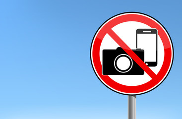 No photo and no phone sign - forbidden sign sky background