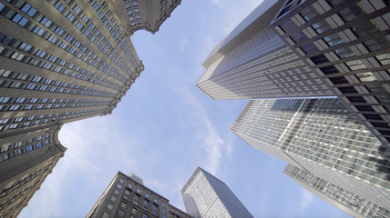 Vertical View of Modern High Rise Skyscraper Office Buildings in Business Finance District