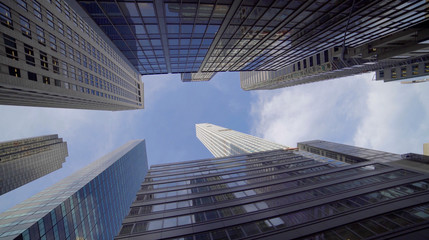 Obraz na płótnie Canvas Vertical View of Modern High Rise Skyscraper Office Buildings in Business Finance District