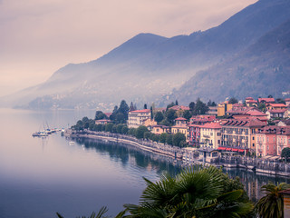 Image of a panorama view of cannero riviera at lake maggiore in italy on a foggy cloudy day