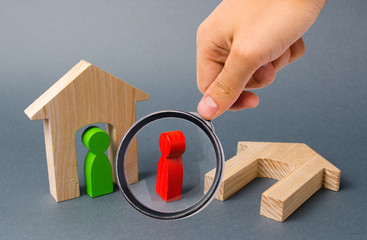 Magnifying glass is looking at a man who has lost his home is asking for help and shelter from his...