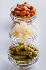 pickled vegetables on a white acrylic background