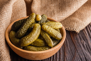 pickled vegetables on a wooden rustic background