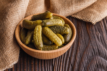 pickled vegetables on a wooden rustic background