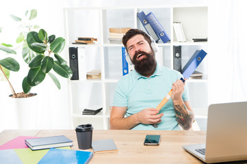 Businessman with beard and mustache gone mad with hammer in a hand. Frustrated office worker...