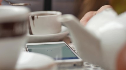 Business woman using a Smart phone Touchscreen CHROMA KEY- Close-up , Fingers make gestures touching typing text and swiping and scrolling the screen of a modern smartphone