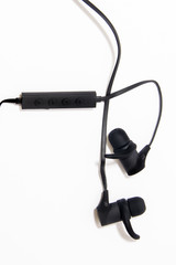 in-ear headphones for sports on a white background