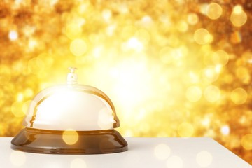 Vintage hotel reception service desk bell.