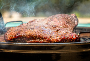 Smoked brisket on the bbq grill