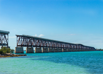 Fototapeta na wymiar The Bahia Honda Rail bridge in the lower Florida Keys once connected Bahia Honda key with the Spanish Harbor Key