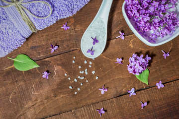 Aromatherapy, wellness and spa with lilac flowers