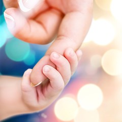 New born baby hand on background