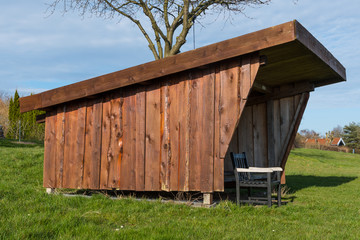 Wooden Lean-to building on the Danish countryside