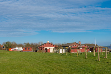 Fishing cottages in village of Kalvehave in Denmark