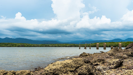 Landscape of clouds over the old bridge at Moken Village Ko Lao Ranong province Thailand © khamkula
