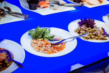 boiled white beans with carrots, buffet concept