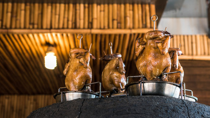 Taiwanese Brick kiln and roasted chicken in huge clay oven.