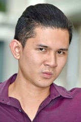 Obraz premium Confused Handsome Filipino Person