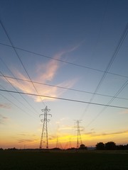 Sunset through the power lines