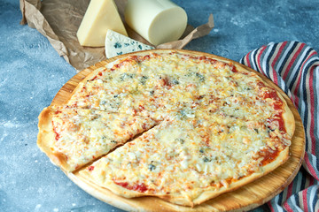 Slice of hot pizza large cheese lunch or dinner crust seafood meat topping sauce. with bell pepper...