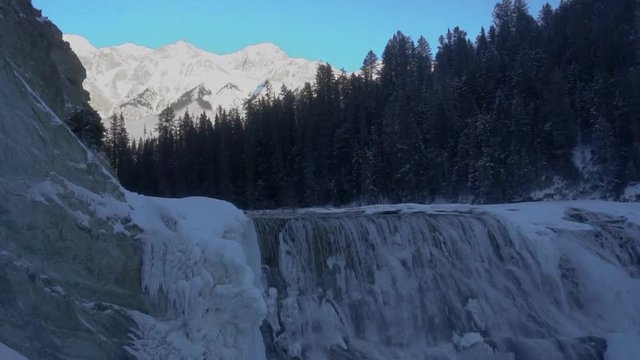 water falls on hike with beautiful big mountain 60 fps slow motion optional