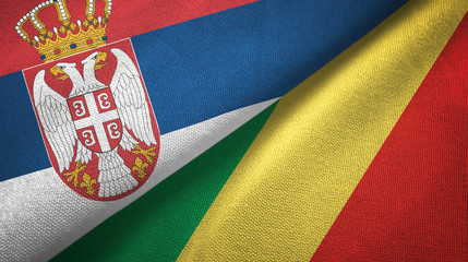 Fototapeta premium Serbia and Congo two flags textile cloth, fabric texture
