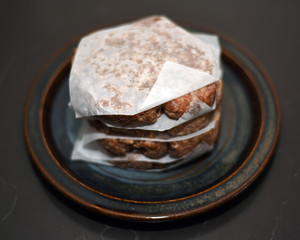 Raw hamburger patties on plate