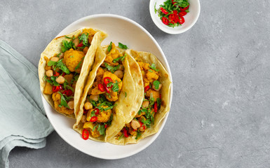 Tortilla with aloo gobi and chickpeas top view