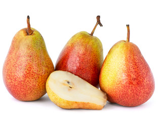 Three fragrant ripe and appetizing speckled pears with dried branches from the tree on which they grew