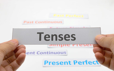 tenses cards over white background