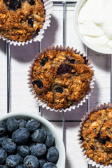 fresh sweet blueberry muffins, vertical