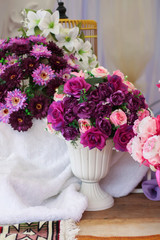 Close-up and selective focus of artificial flower use as wedding dais decoration. Wedding dais also known as 