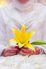 Fototapeta na wymiar wedding bouquet in bride's hands