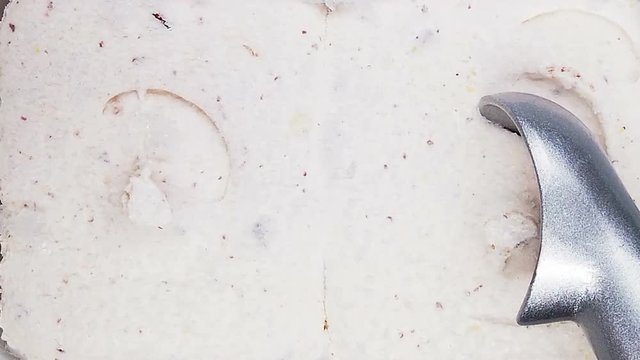 slow motion of spoon taking chestnut and red bean ice cream