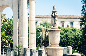 Traditional architecture of Catania,  baroque pillars - fragment of historical building.