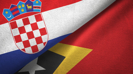 Fototapeta premium Croatia and Timor-Leste East Timor two flags textile cloth, fabric texture