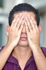 Fototapeta premium Ashamed Young Filipino Person