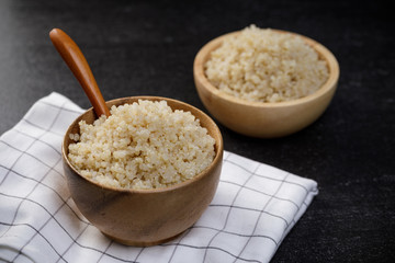 Healthy quinoa in the wooden bowl, Healthy food habits and concept of balanced diet