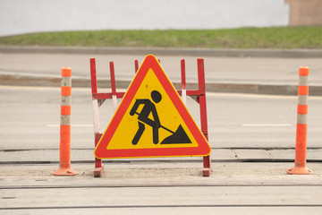 Road signs in a street under reconstruction
