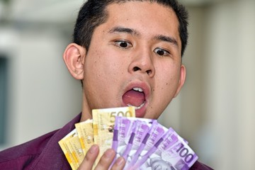 A Male Counting Money