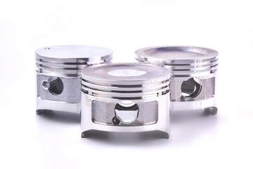 The piston of the engine is on a white background.