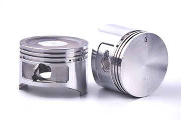 The piston of the engine is on a white background.