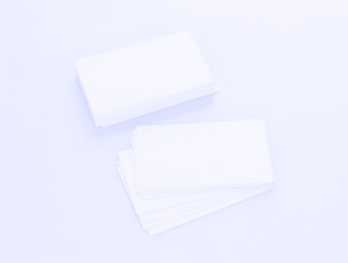 Mockup of business cards on white textured paper background