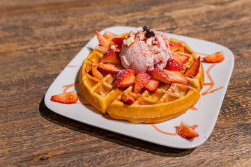 Close up shot of a dish of strawberry waffle