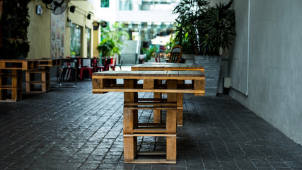 Wooden Pallet table in an urban alley 