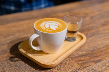 Close up shot of a cup of Latte coffee
