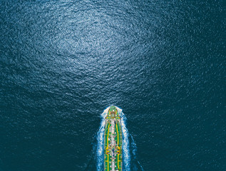 Aerial top view Oil ship tanker on the sea transportation oil from refinery.