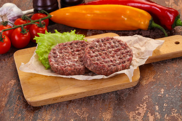 Raw burger cutlet
