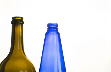  bottles on a white background. bottles of multicolored glass. alcoholic beverages. bottle neck background